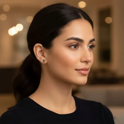 model wearing tar studs smoky quartz 5x7mm oval