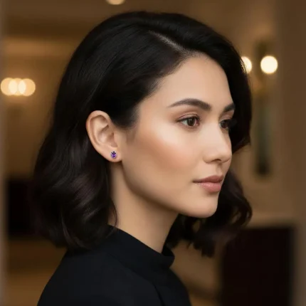 model wearing tar studs amethyst 5x7mm oval