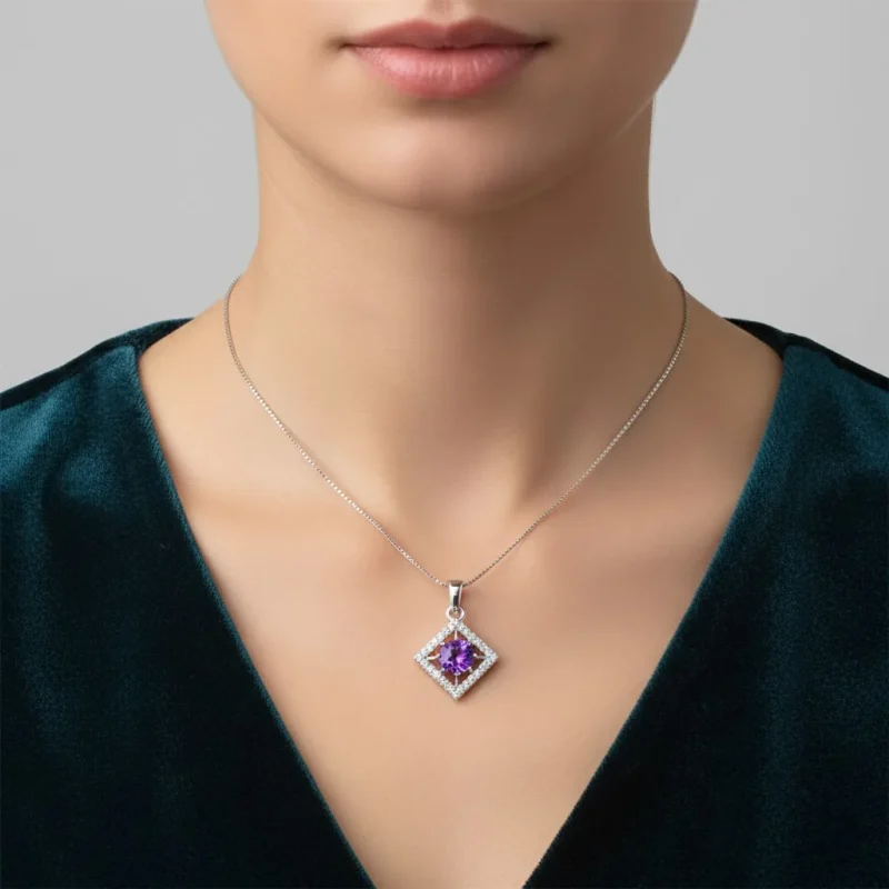 model wearing beautiful square shaped silver pendant with amethyst and cubic zirconia
