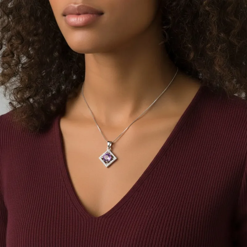 model wearing beautiful square shaped silver pendant with brazilian amethyst and cubic zirconia