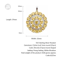 details of round shaped citrine and cubic zirconia studded silver pendant