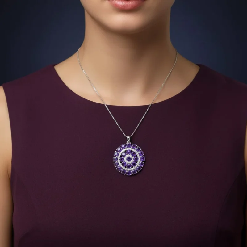 model wearing round shaped amethyst and cubic zirconia studded silver pendant