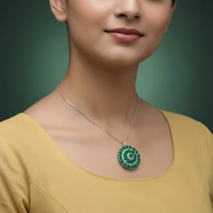 model wearing round shaped green onyx and cubic zirconia studded silver pendant