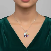 model wearing 5x7 pear shaped multi gemstone with cubic zirconia flower shaped silver pendant