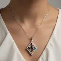 model wearing multi gemstone studded silver pendant with cubic zirconia