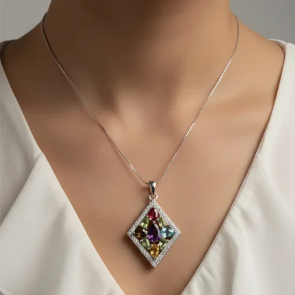 model wearing multi gemstone studded silver pendant with cubic zirconia