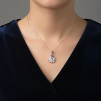 model wearing 5x7 mm pear shaped brazilian amethyst with cubic zirconia silver flower pendant