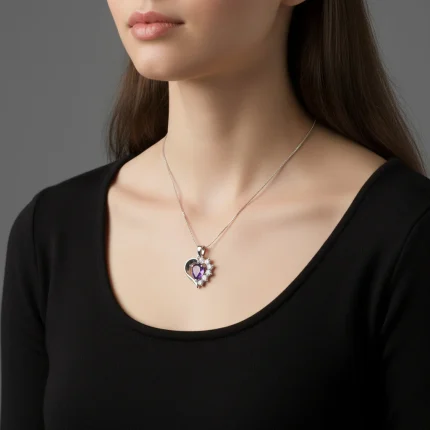 model wearing 5x7 mm pear shaped amethyst with cubic zirconia silver heart shaped pendant