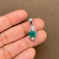 5x7mm octagon shaped green onyx with cubic zirconia silver pendant displaying on hand