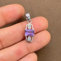 5x7mm octagon shaped with brazilian amethyst cubic zirconia silver pendant displaying on hand