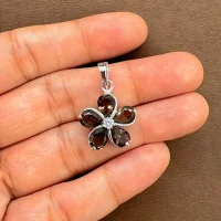 beautifully portraying the smoky quartz silver pendant on hands