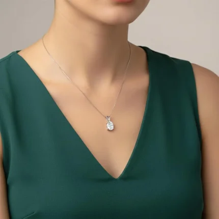model wearing silver pendant single piece 6x8mm oval cubic zirconia