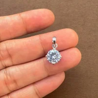single piece 8mm silver pendant cubic zirconia displayed on hand