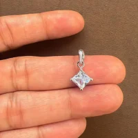 single piece 6mm square silver pendant cubic zirconia displayed in hand