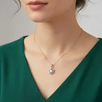 model wearing flower shaped 5mm round cubic zirconia silver pendant