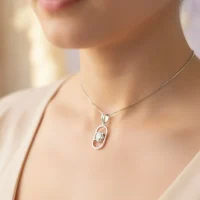 model wearing oval shaped 5x7 mm cubic zirconia pendant