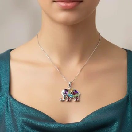 model wearing silver pendant elephant design with multi gemstone