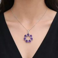 model wearing silver pendant round shaped with 6mm round amethyst