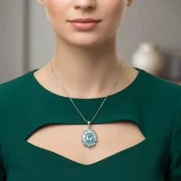 model wearing silver pendant flower shaped with blue topaz