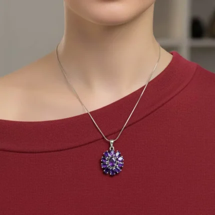 model wearing silver pendant flower shaped with amethyst