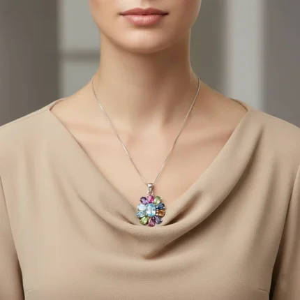 model wearing silver pendant flower shaped with multi gemstone