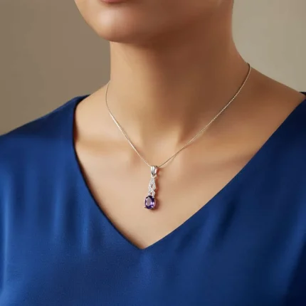 model wearing silver pendant with 5x7 mm oval amethyst