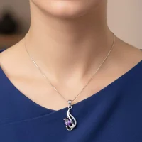 model wearing silver pendant with 5x7 mm oval amethyst