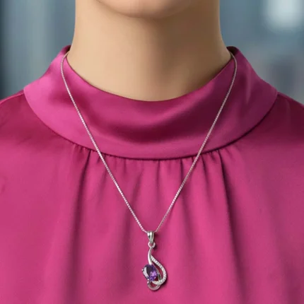 model wearing silver pendant with 5x7 mm oval brazilian amethyst