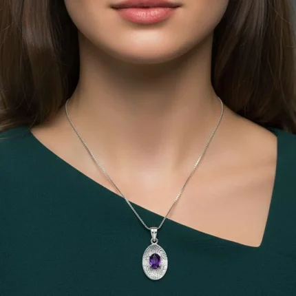 model wearing silver pendant with 5x7 mm oval amethyst