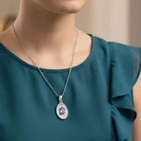 model wearing silver pendant with 5x7 mm oval brazilian amethyst