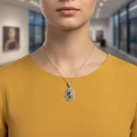 model wearing silver pendant with 5x7 mm oval smoky quartz