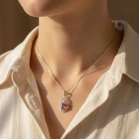 model wearing silver pendant with 5x7 mm oval brazilian amethyst