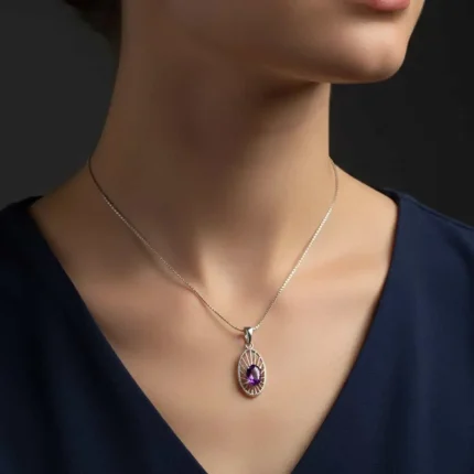 model wearing silver pendant with 5x7 mm oval amethyst