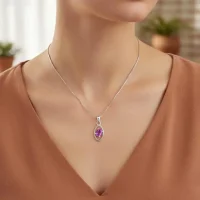 model wearing silver pendant with 6x4 mm oval brazilian amethyst