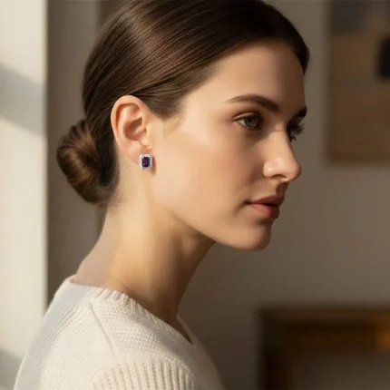 model wearing silver studs cluster with 5x7 mm octagon Amethyst and cubic zirconia