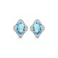 silver studs with 7x9 mm oval Blue Topaz and cubic zirconia