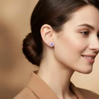 model wearing silver studs cluster with 6mm round Brazilian Amethyst and cubic zirconia