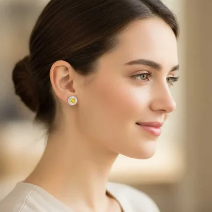 model wearing silver studs cluster with 6mm round Citrine and cubic zirconia