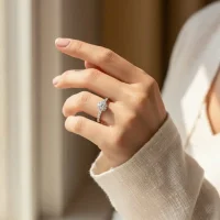 model wearing silver ring cluster with 3mm round cubic zirconia