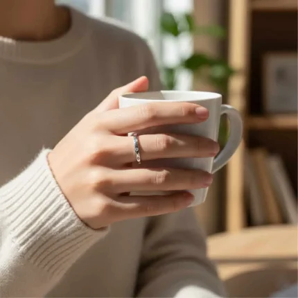 model wearing Silver Ring (challa) with small round Cubic Zirconia