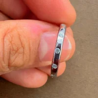 Silver Ring (challa) with small round Cubic Zirconia displayed on hand