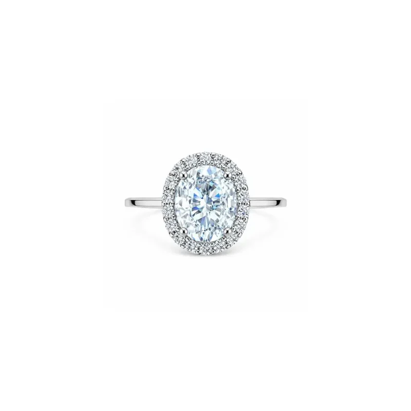 silver ring cluster with 7x9 mm oval cubic zirconia