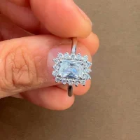 silver ring with cubic zirconia with 5x7 mm octagon shaped zirconia cluster displayed on hand