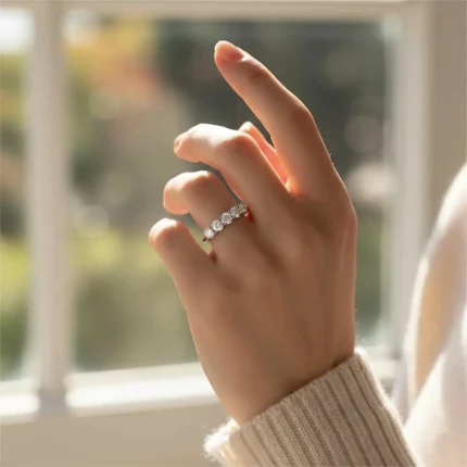 model wearing Silver Ring with 4 mm round shaped Cubic Zirconia
