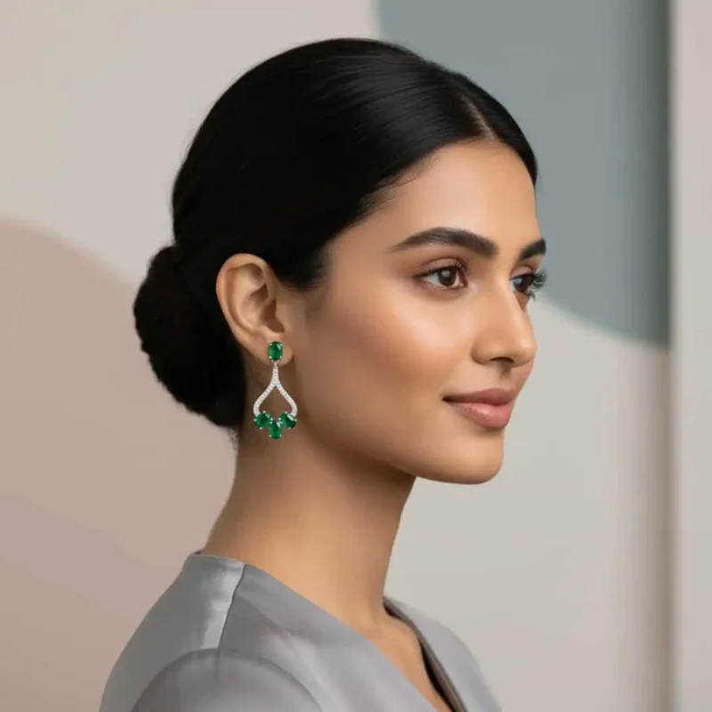 model wearing Silver Earrings with 5x7 mm oval shaped Green Onyx Gemstone and Cubic Zirconia