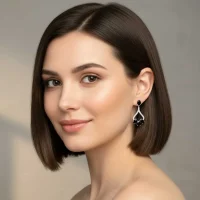 model wearing Silver Earrings with 5x7 mm oval shaped Black Onyx Gemstone and Cubic Zirconia