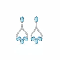 5x7 mm oval shaped Blue Topaz Gemstone and Cubic Zirconia