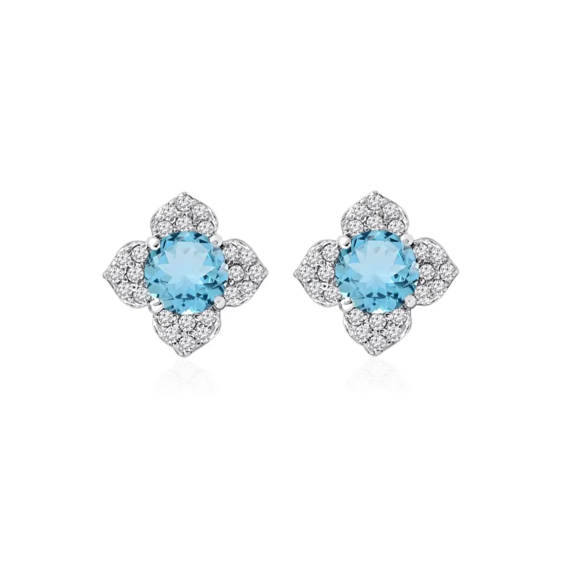 Silver Studs flower shaped with 6mm round shaped Blue Topaz Gemstone and Cubic Zirconia